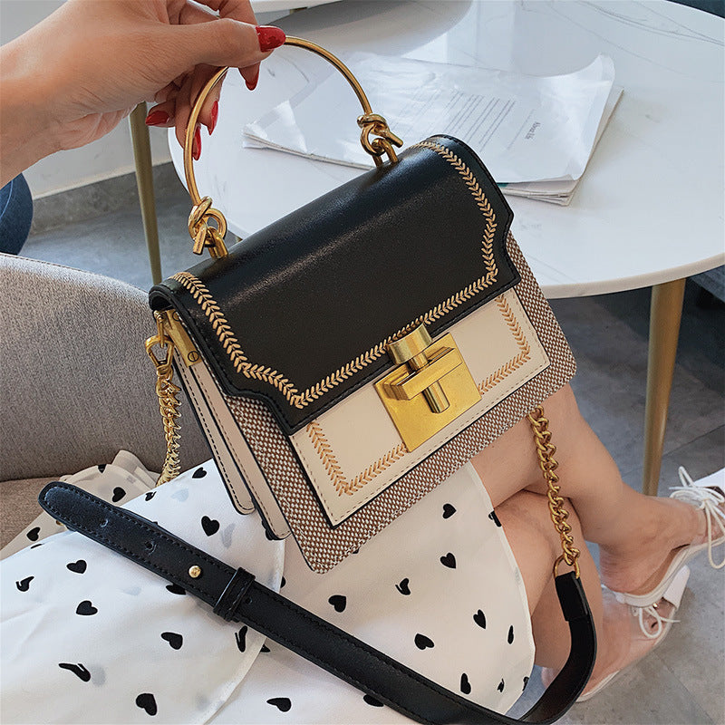 Lynda – Modische Schultertasche mit Kettenstruktur