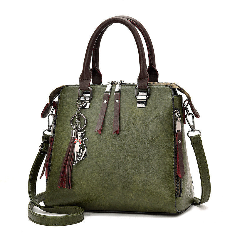 Audrey – Große Damenhandtasche mit veganem Leder und Quaste