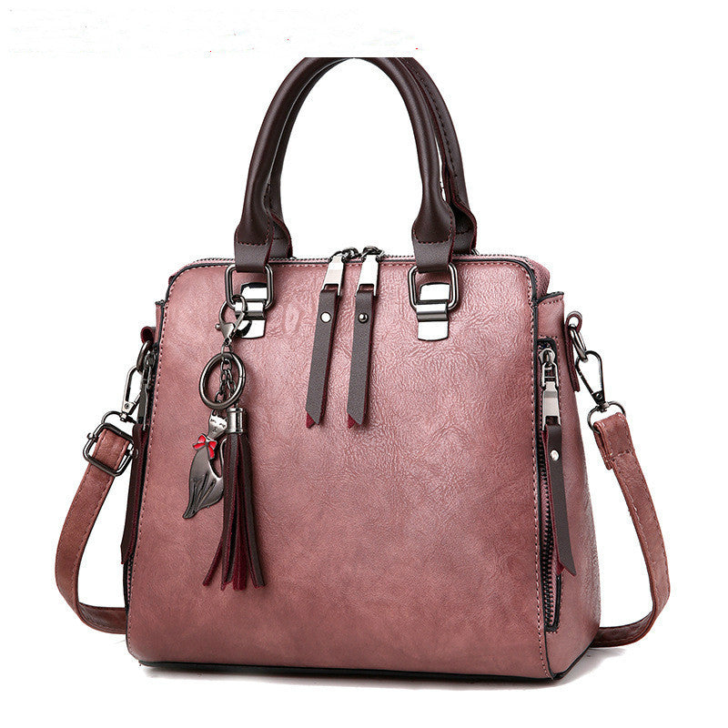Audrey – Große Damenhandtasche mit veganem Leder und Quaste