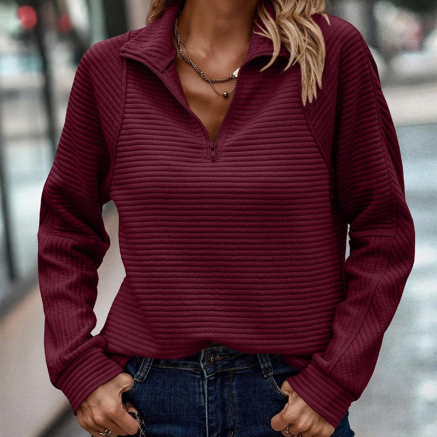 Perry – Lockerer Pullover mit Schlangenmotiv und Reißverschluss