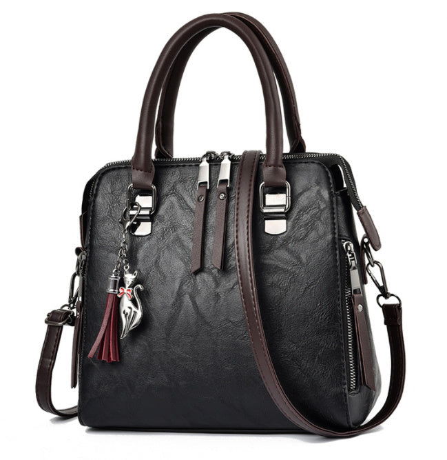 Audrey – Große Damenhandtasche mit veganem Leder und Quaste