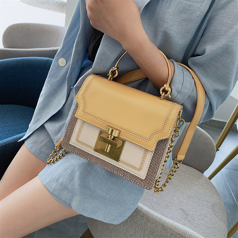 Lynda – Modische Schultertasche mit Kettenstruktur