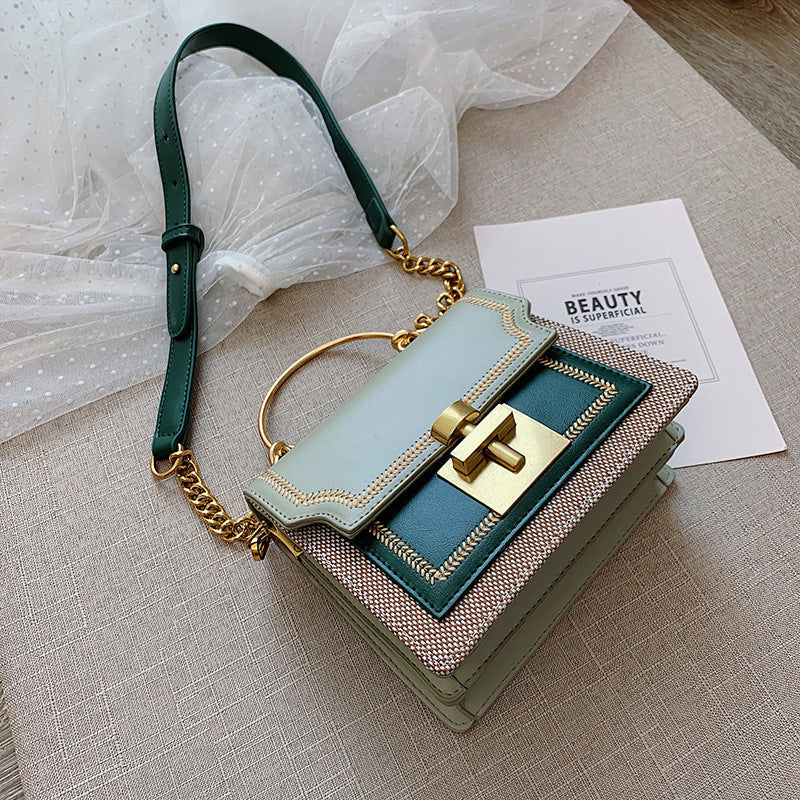 Lynda – Modische Schultertasche mit Kettenstruktur