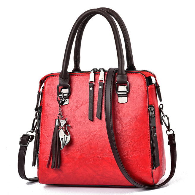 Audrey – Große Damenhandtasche mit veganem Leder und Quaste