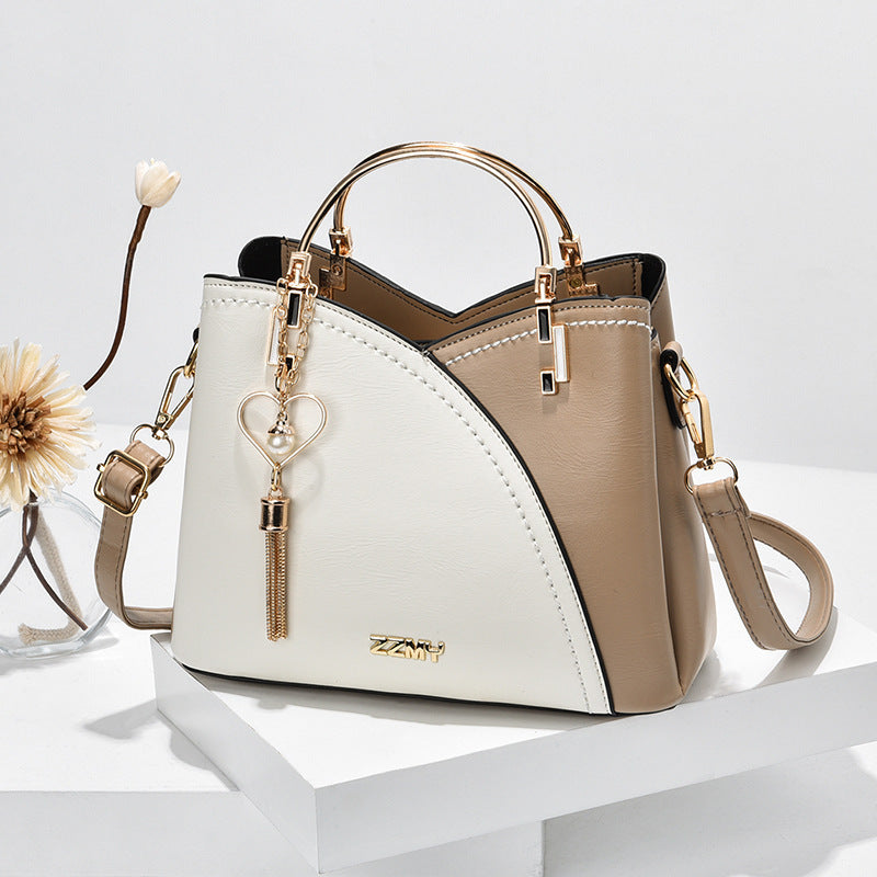 Jade – Farbblock-Handtasche mit Quasten-Dekor für Damen