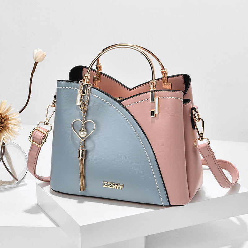 Jade – Farbblock-Handtasche mit Quasten-Dekor für Damen