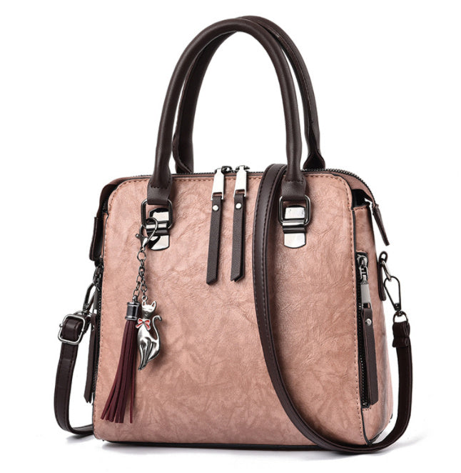 Audrey – Große Damenhandtasche mit veganem Leder und Quaste