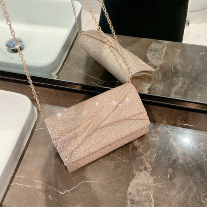 Megan – Goldene Mode Umschlag Clutch