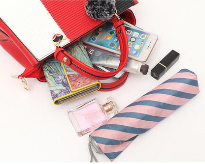 Patricia – Damen-Handtasche mit Haarballen-Ornamenten
