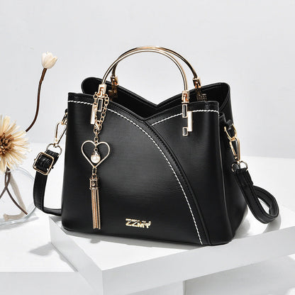 Jade – Farbblock-Handtasche mit Quasten-Dekor für Damen