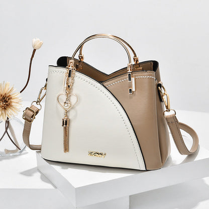 Jade – Farbblock-Handtasche mit Quasten-Dekor für Damen