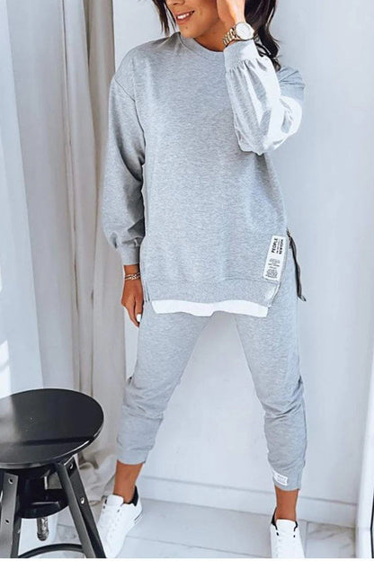 Adele – Modisches Damen-Sweatshirt mit Schlitzdesign und Slim-Fit-Hose Zweiteiler